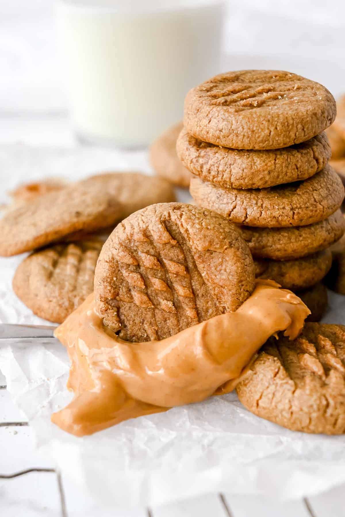 oat flour peanut butter cookies dipped in peanut butter.