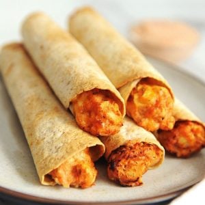 air fryer chicken taquitos on a plate.
