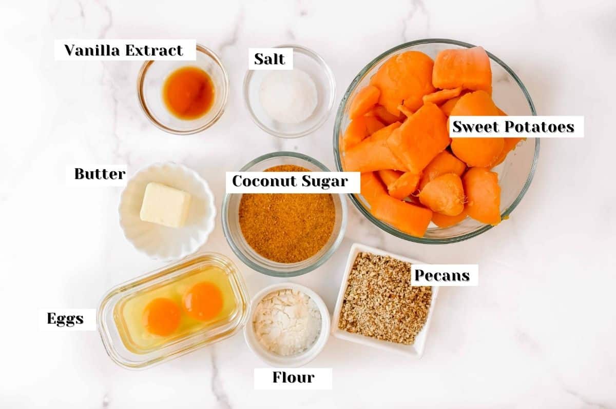 labeled ingredients for this sweet potato casserole recipe on a white background.