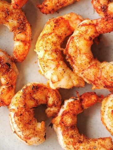 air fryer argentine red shrimp close up on a plate.