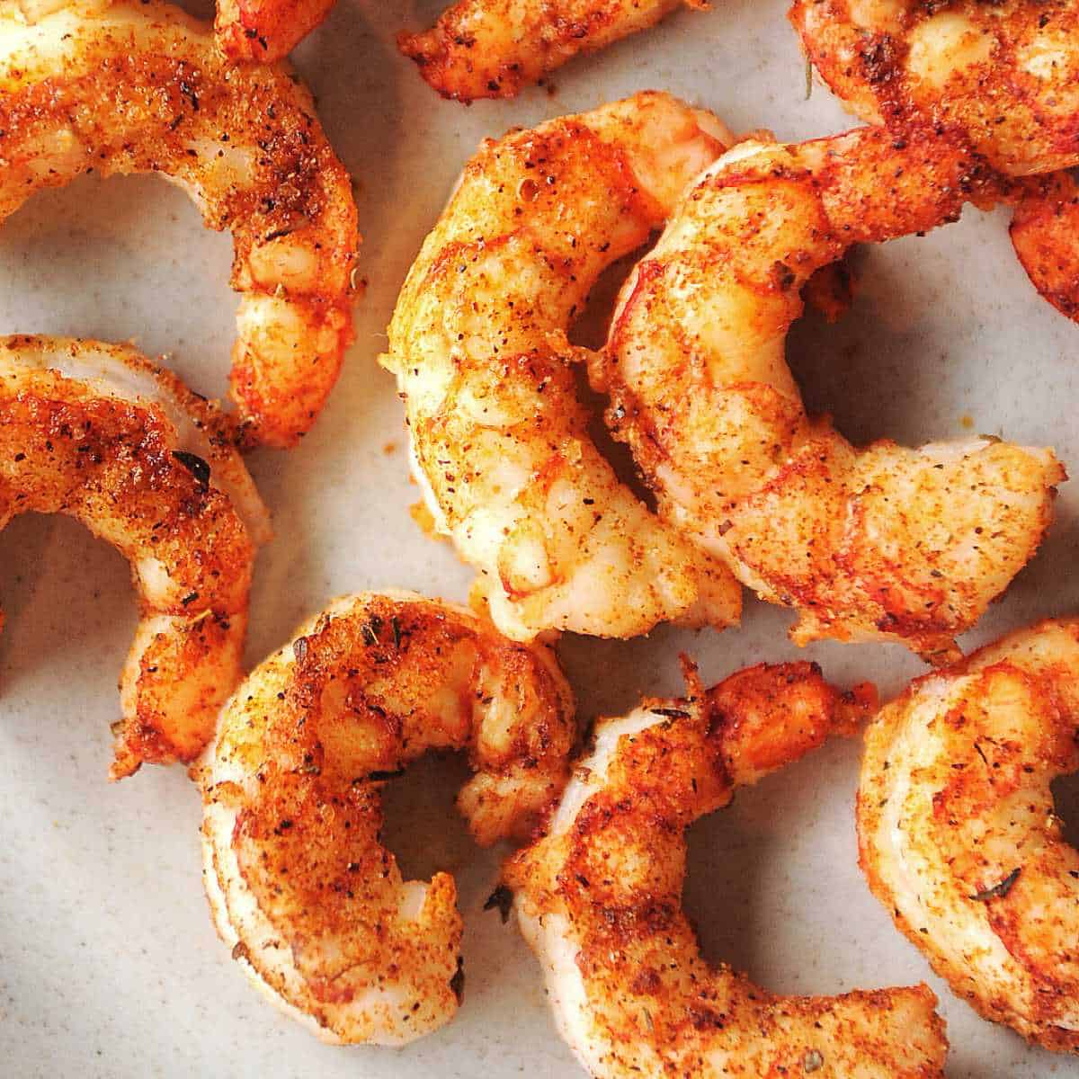 air fryer argentine red shrimp close up on a plate.