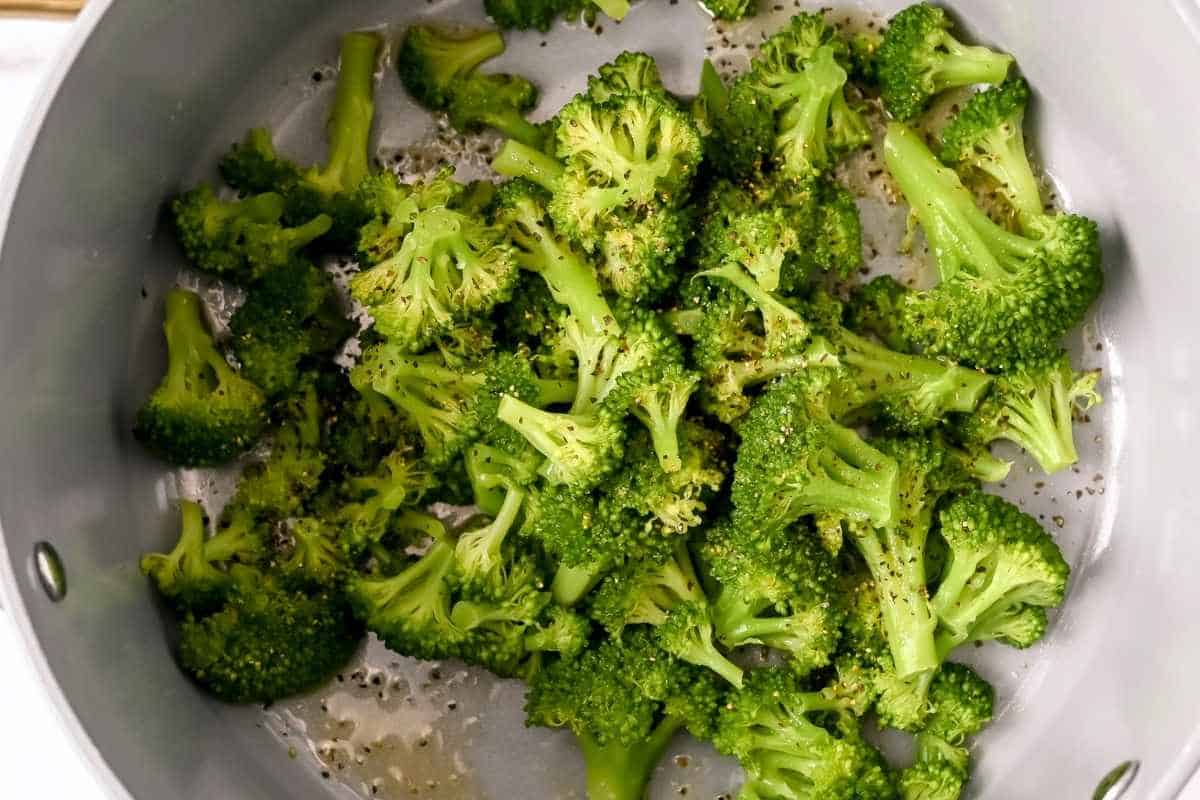seasoned broccoli in a pot.
