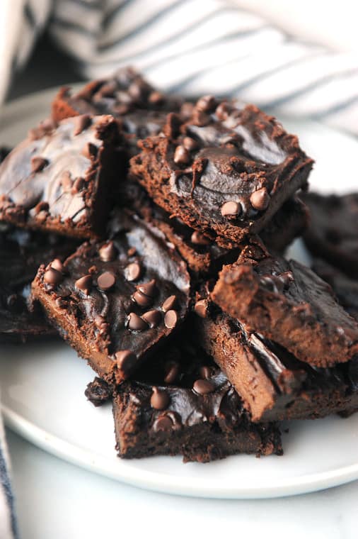 Sweet potato brownies with only four ingredients are easy to make!  These brownies are vegan, paleo and flourless and delicious! No flour, sugar or eggs!