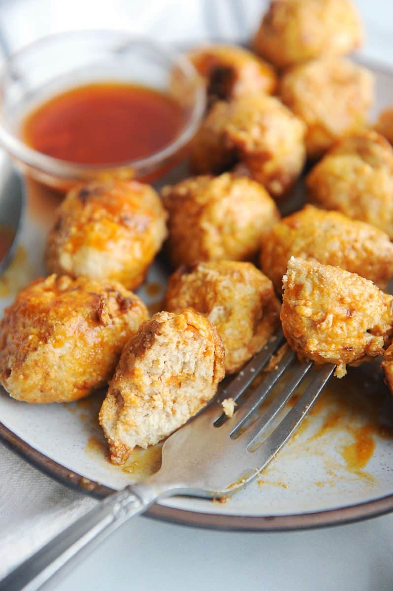plate of buffalo chicken meatballs with a fork