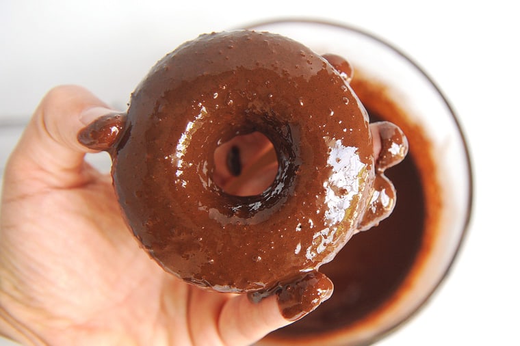 These chocolate cake donuts with no yeast are paleo donuts for any season!  Topped with glaze and sprinkles these keto chocolate donuts are just delicious!