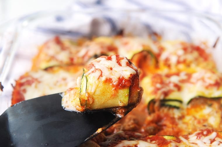 Zucchini Lasagna Rolls are an easy summer dinner to make using fresh zucchini! Zucchini, cheese & sausage is a low carb and healthy lasagna alternative!