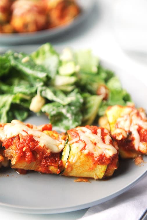 Zucchini Lasagna Rolls are an easy summer dinner to make using fresh zucchini! Zucchini, cheese & sausage is a low carb and healthy lasagna alternative!