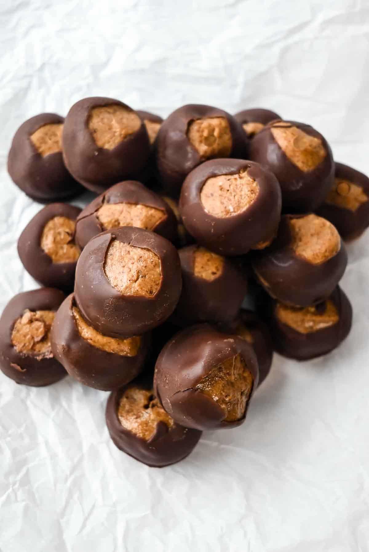 pile of buckeye candy on white background.