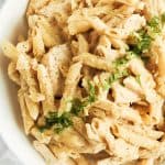 healthy crock pot chicken alfredo with dairy free alfredo sauce. Creamy and delicious healthy chicken alfredo pasta recipe you can make in the slow cooker for a family friendly one pot meal.