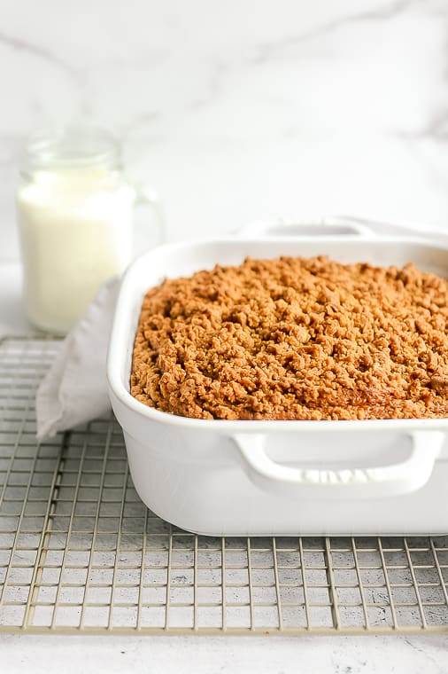 Dairy free pumpkin coffee cake with pumpkin spice streusel. Healthy and easy pumpkin spiced coffee cake for chilly fall mornings! Can be made with cake mix and in a 9X13 or 8X8 pan.