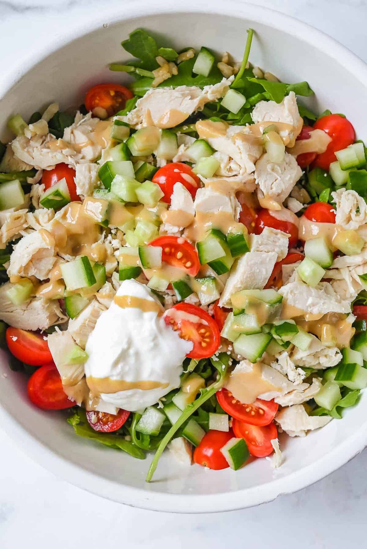 shot of Panera Mediterranean Bowl recipe in a white bowl on a white background.