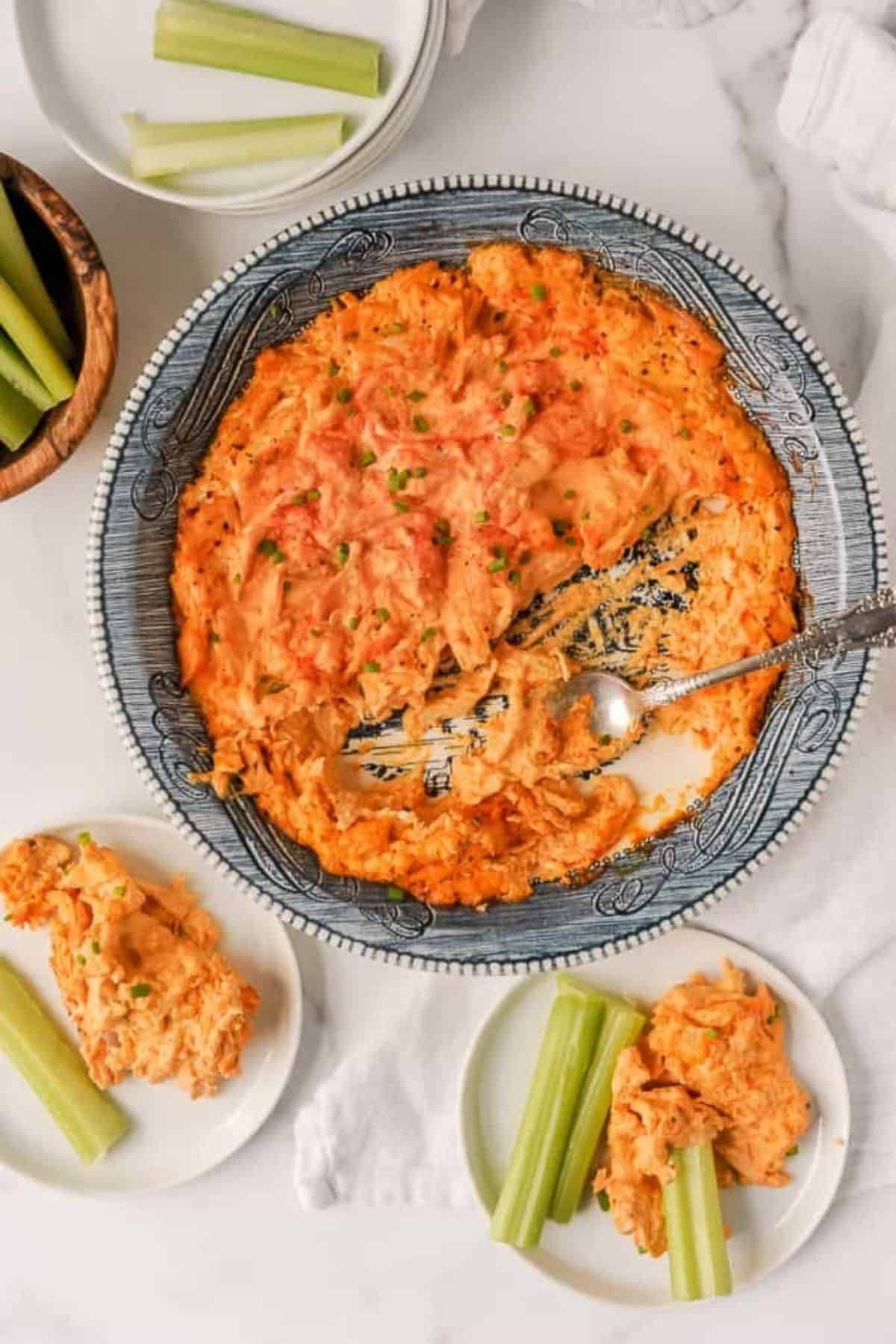 healthy buffalo chicken dip served with celery