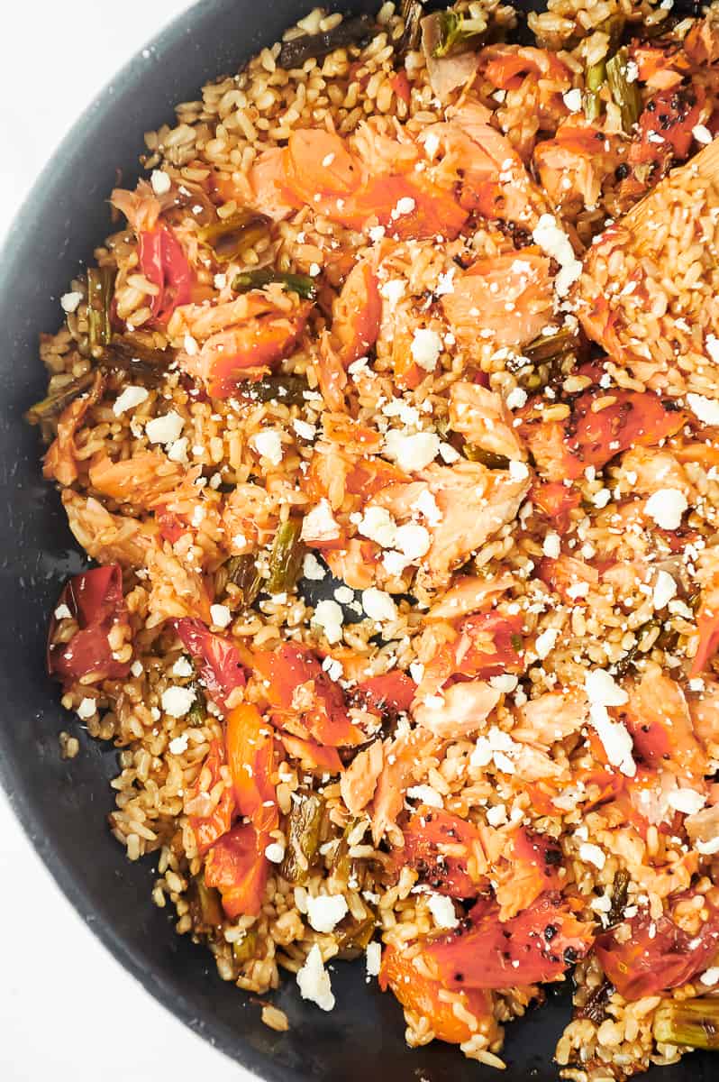 skillet with salmon and rice