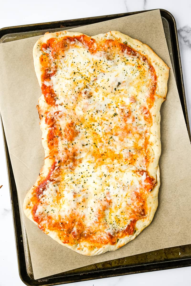 homemade flatbread pizza on a sheet pan