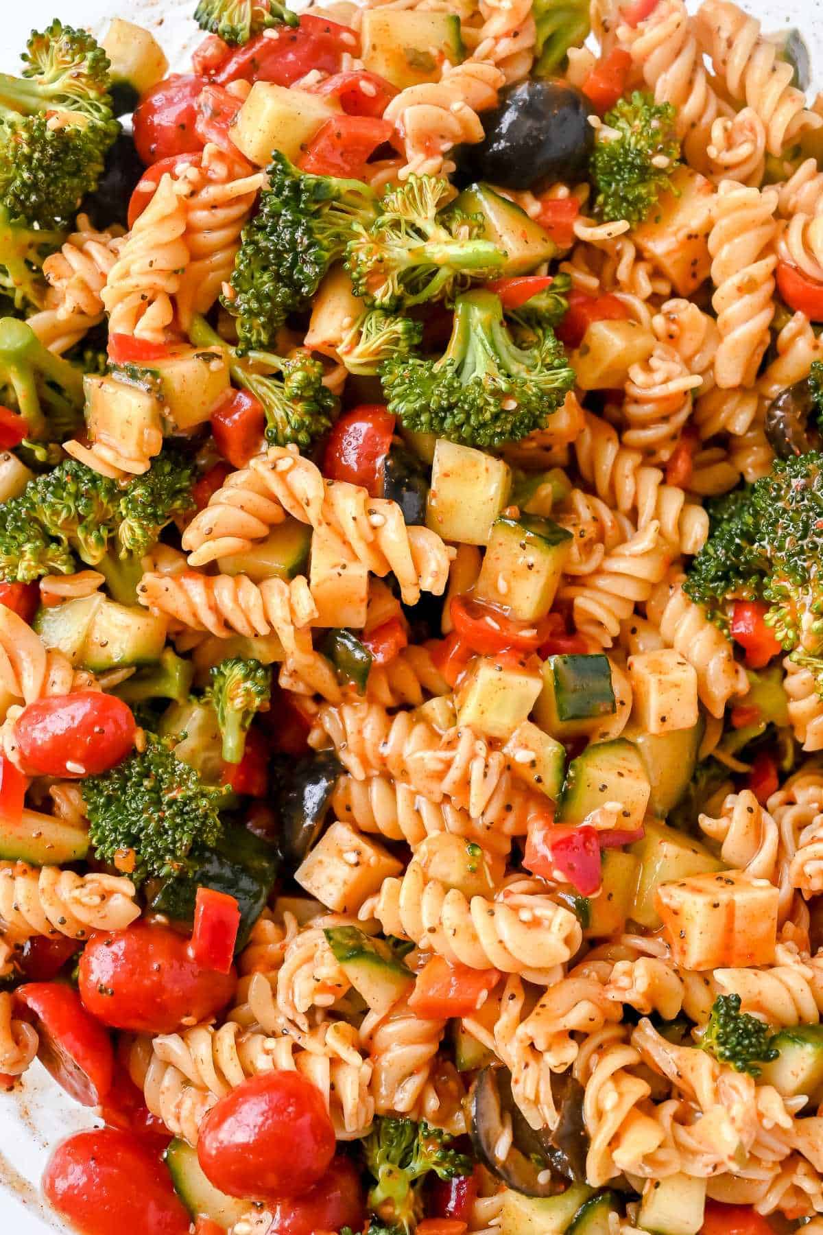 close up shot of gluten-free pasta salad with vegetables.