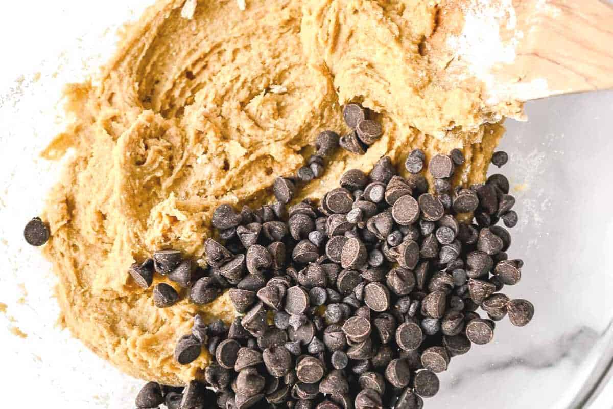close up shot of cookie dough with chocolate chips.