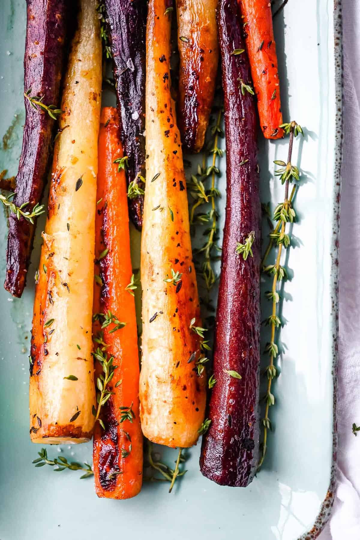 plate of honey roasted colorful carrots with thyme