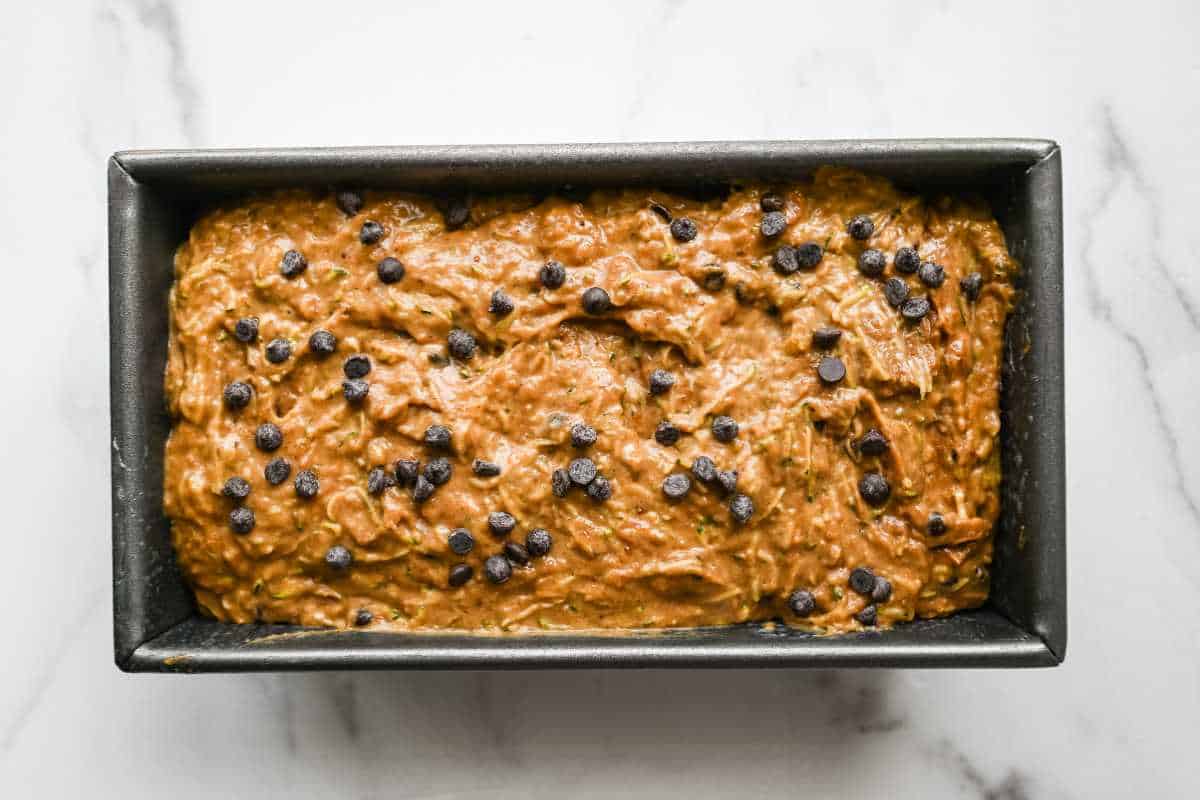 unbaked zucchini bread in a loaf pan.
