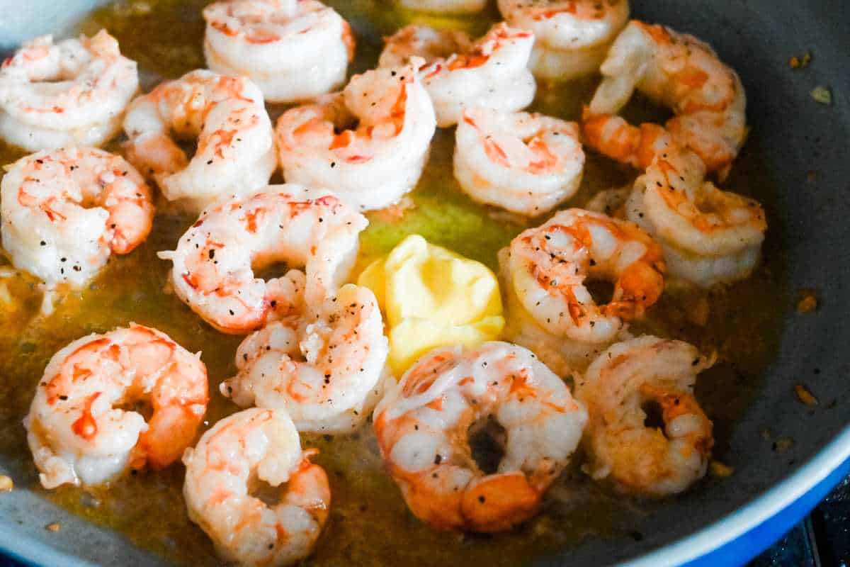 shrimp in a pan with butter.
