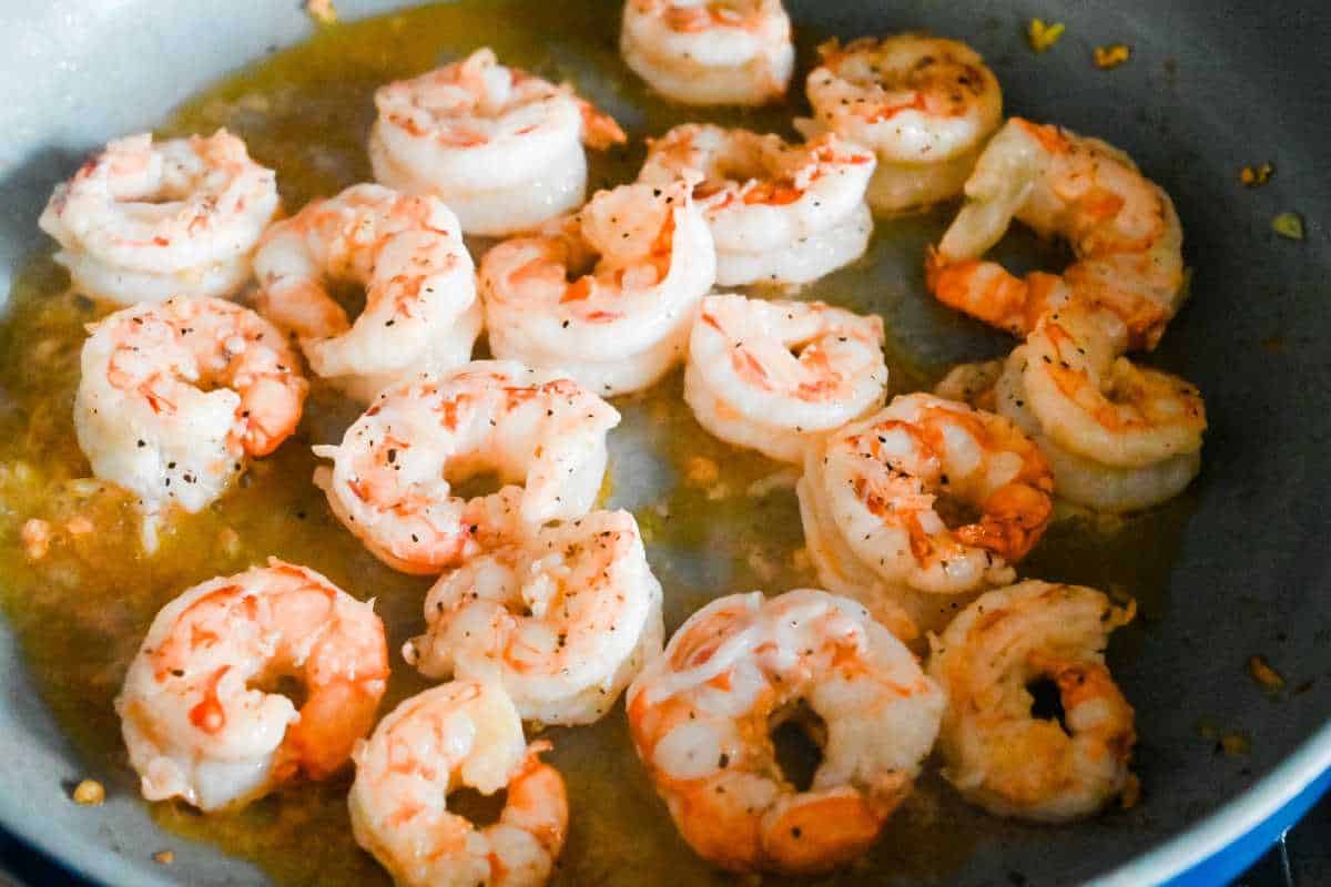 cooked shrimp in a pan.