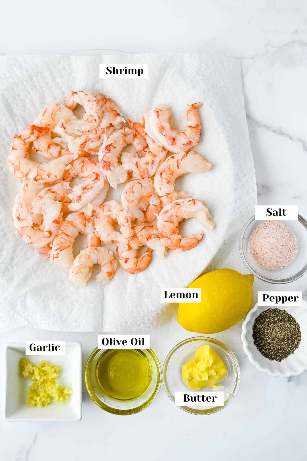 ingredients for this pan seared shrimp recipe on a white background.