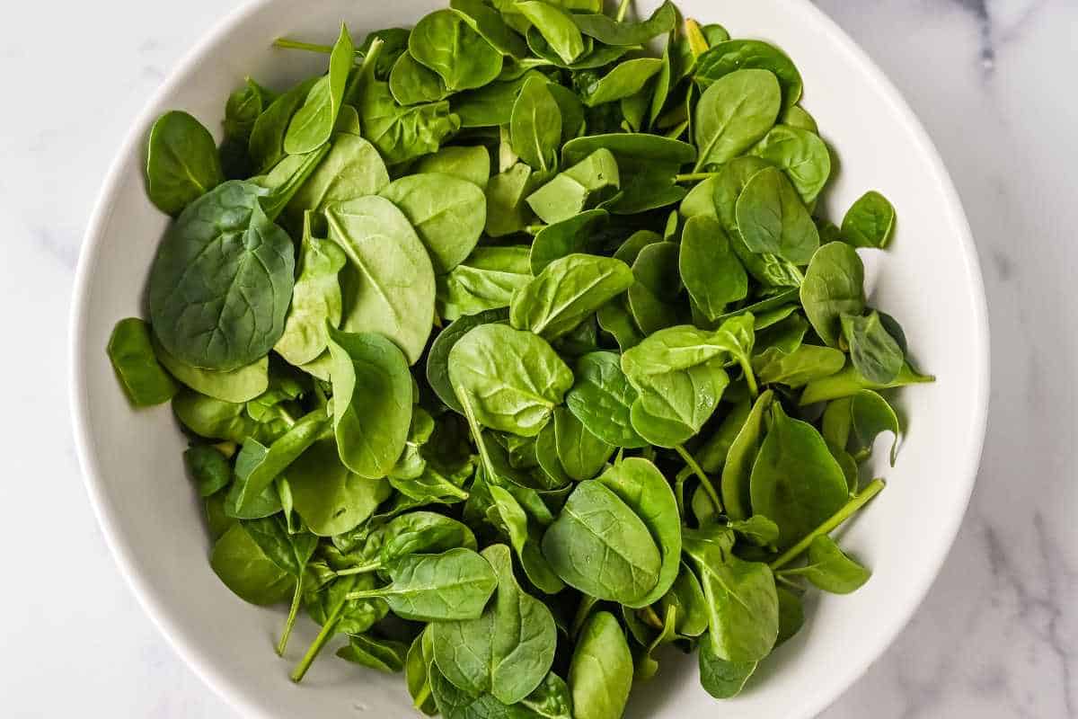 spinach in a white bowl.