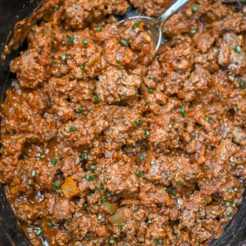 close up of cooked taco meat in a crock pot.