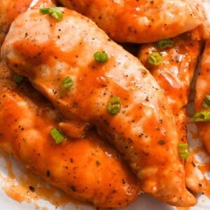 close up of buffalo chicken tenders with no breading.