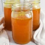 featured image for homemade bone broth in glass jars.