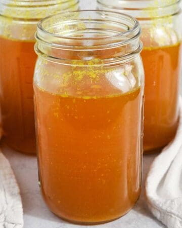 featured image for homemade bone broth in glass jars.