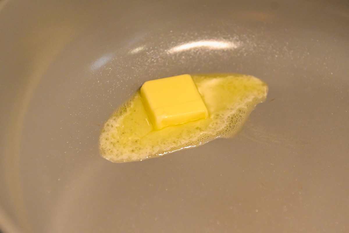 melting butter in a pan.