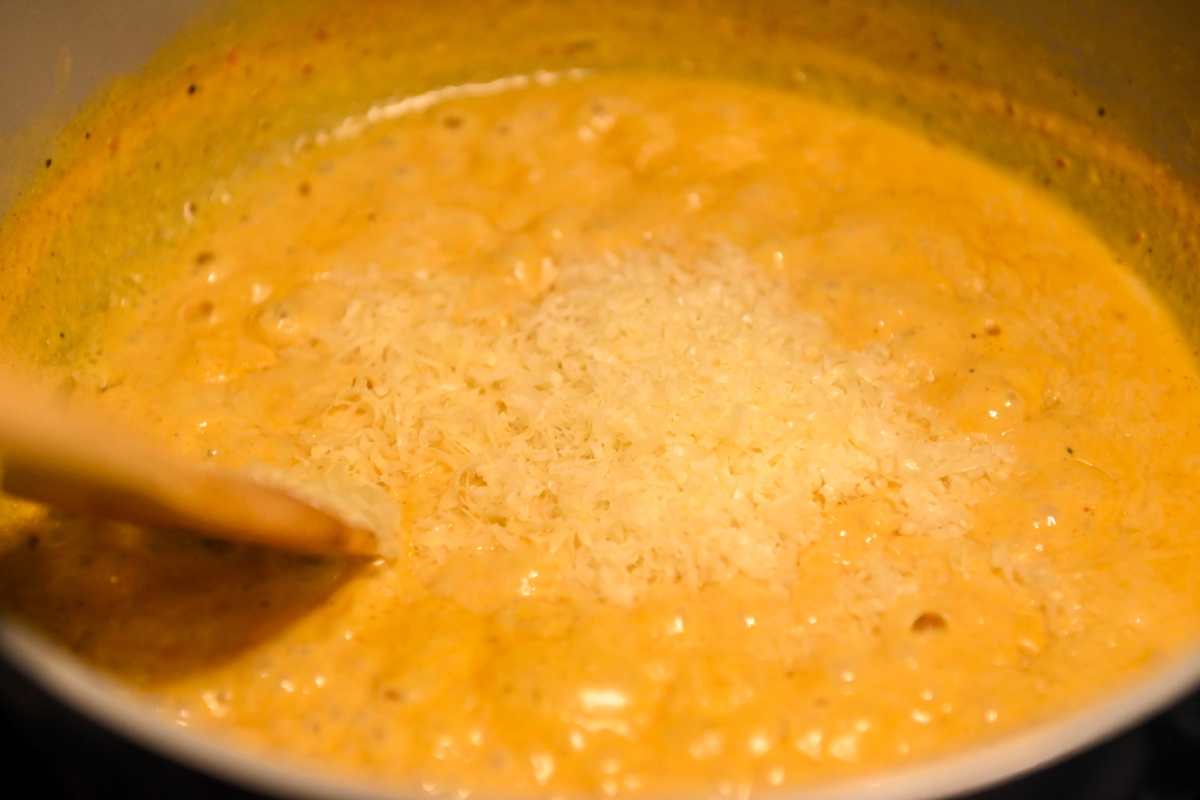 creamy cajun sauce with parmesan cheese on top.