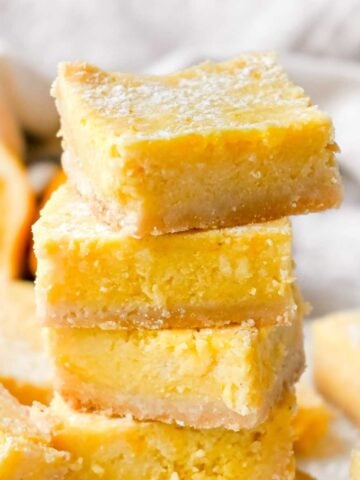close up stack of meyer lemon bars.